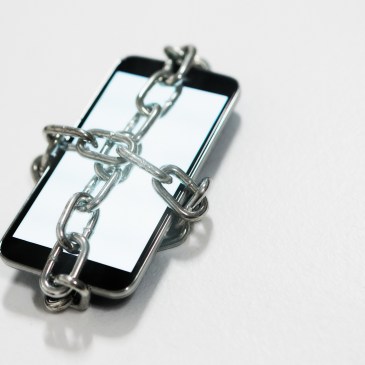 smart phone wrapped in chain
