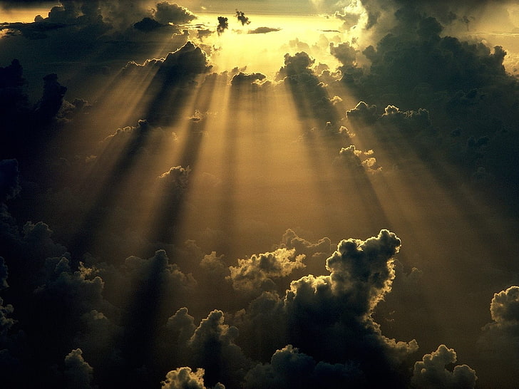 Sun peaking through clouds, peace